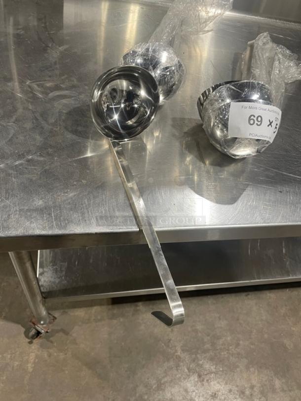 New Adcraft LD12 stainless steel 12 oz serving ladle. Pristine condition. Model: LD-12, auction tag visible.