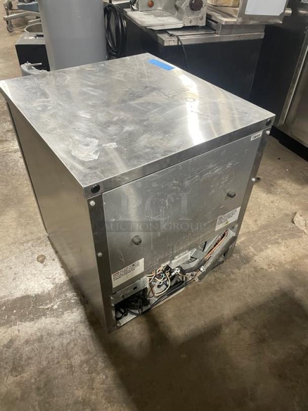 True commercial undercounter refrigerator, TUC-27G-LP-HC-LD, poly-coated rack, stainless steel, glass door, visible wiring.