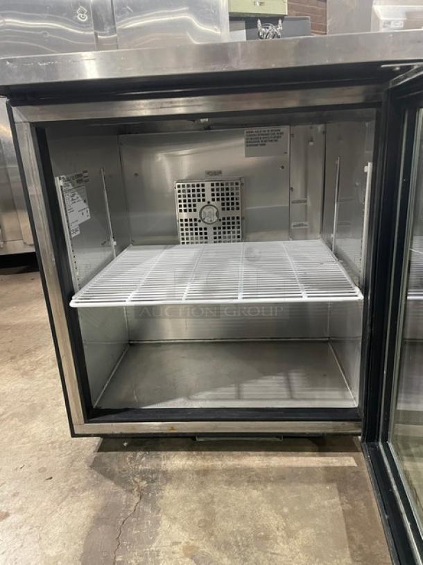 True TUC-27G-LP-HC-LD undercounter refrigerator, stainless steel with glass door and poly coated wire rack.
