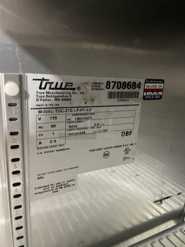True commercial stainless steel undercounter merchandiser refrigerator, model TUC-27G-LP-HC-LD, with poly coated rack.