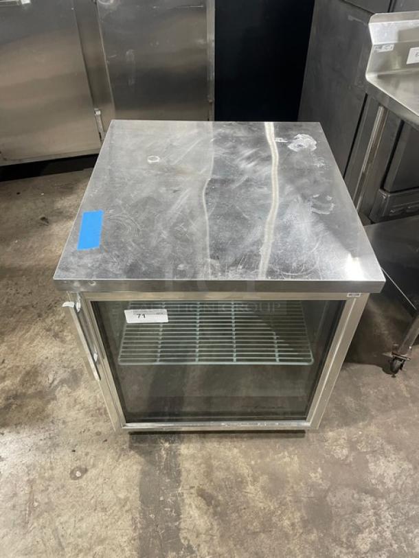 True commercial stainless steel undercounter glass door merchandiser refrigerator, Model TUC27GLPHCLD, with poly-coated rack.