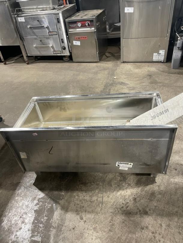 Regency commercial stainless steel ice bin with upturned backsplash and legs. Scratch-and-dent condition.