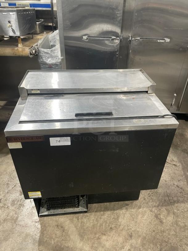 Beverage-Air commercial black powder-coated/stainless steel bottle cooler, single deep-well with easy-slide lid, poly coated wired rack, visible manufacturer's label.