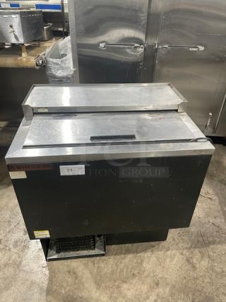 Beverage-Air commercial black powder-coated/stainless steel bottle cooler, single deep-well with easy-slide lid, poly coated wired rack, visible manufacturer's label.