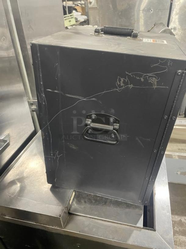 Forbes Ultra Series Black 3-tier insulated food carrier, Model 6272, with stainless steel interior, visible scratches.