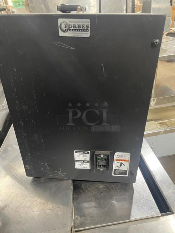 Forbes Ultra Series black 3-tier insulated food carrier, Model 6272. Stainless steel interior, 120V, slight exterior wear.