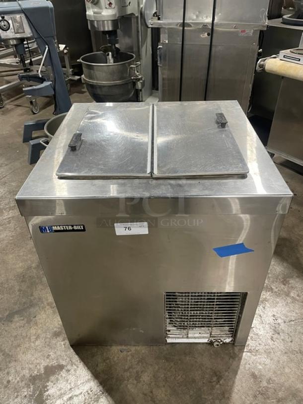 Master-Bilt stainless steel ice cream dipping cabinet, Model DC-4DSE, with flip lid and poly coated wired rack. 115V, 1 Phase.