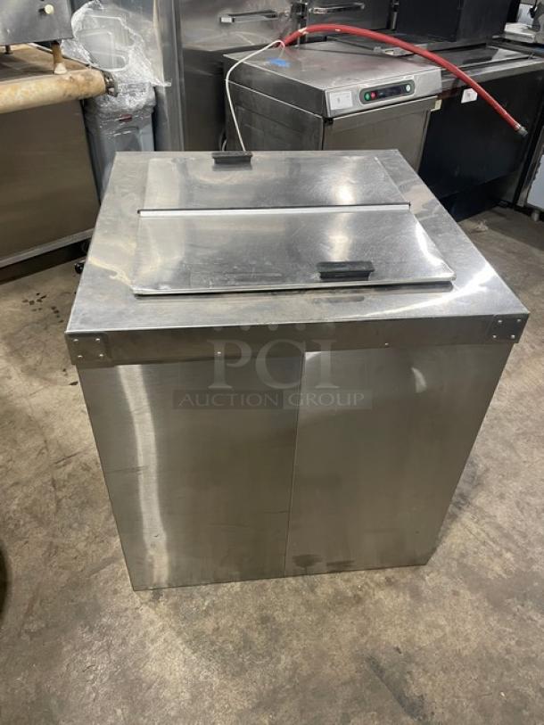 Master-Bilt DC4DSE stainless steel ice cream dipping cabinet, flip lid, poly-coated rack, 115V, 1 phase, used condition.