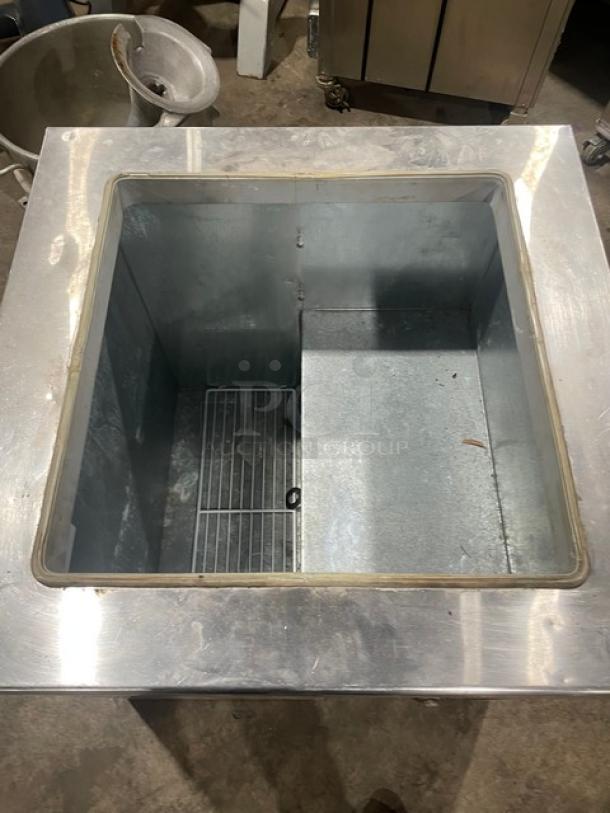 Master-Bilt DC-4DSE stainless steel ice cream dipping cabinet with flip lid, poly-coated wire rack, and serial number 041B00030Y.