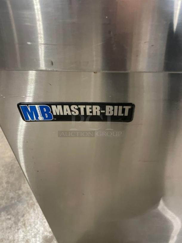 Master-Bilt DC-4DSE stainless steel ice cream dipping cabinet, flip lid, poly-coated rack, near-new condition, 115V 1 phase.