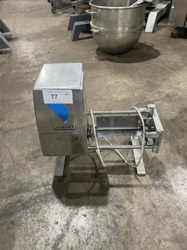 Hobart 403 commercial meat tenderizer, stainless steel, electric, 115V, on legs, includes serial number tag.