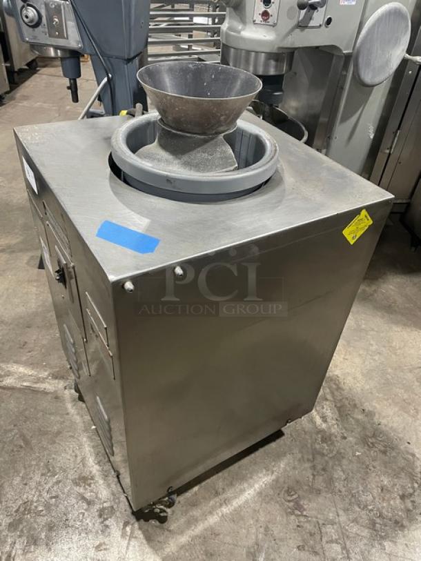 AM Manufacturing R900RT Stainless Steel Dough Rounder, 120V, 1 Phase, on casters, commercial-grade, good condition.