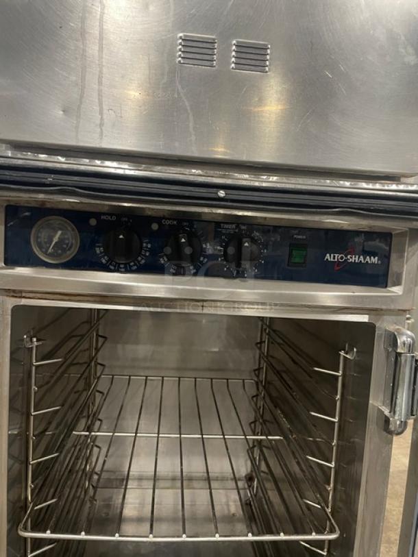 Alto-Shaam Halo Heat 1000-TH/II double stack oven, stainless steel, with wired racks, on casters.