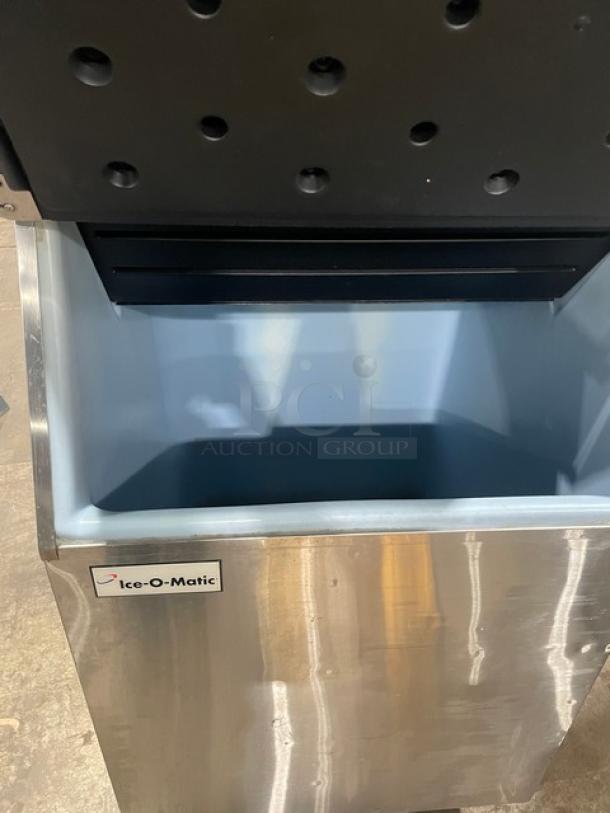 Manitowoc Indigo Series ID0452A-161 dice ice maker, stainless steel, Energy Star certified, with bin, on legs.