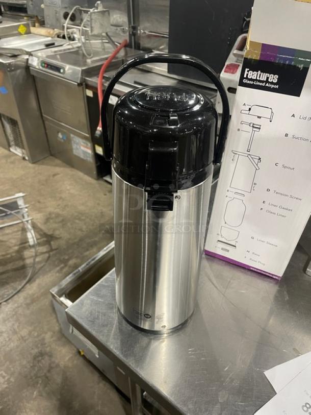 Eco-Air stainless steel airpot with glass lining, black lid; new condition, features listed, ideal for commercial use.