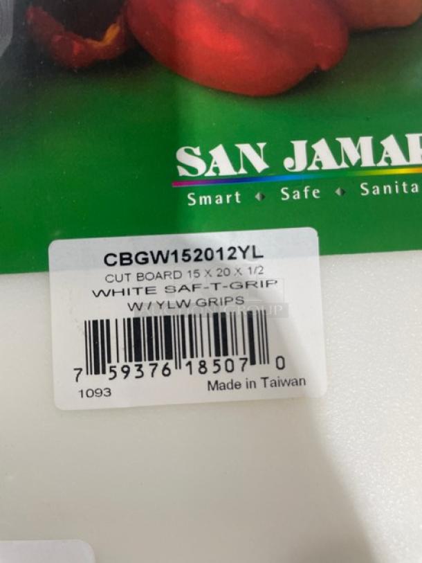 San Jamar Saf-T-Grip cutting board, model CBGW152012YL, white with yellow grips, 15"x20"x0.5", new condition.