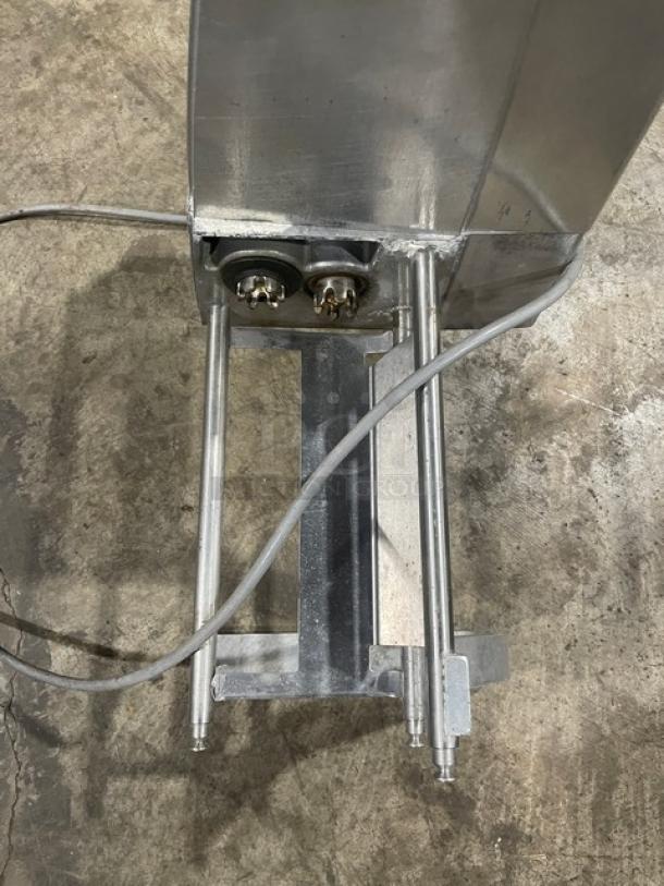Hobart 403-1 commercial stainless steel electric meat tenderizer on legs, showing bottom view with power cable.