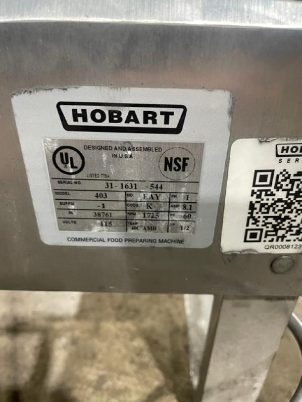 Hobart Model 403-1 stainless steel electric countertop meat tenderizer, serial 31-1631-544, 115V, NSF certified, on legs.