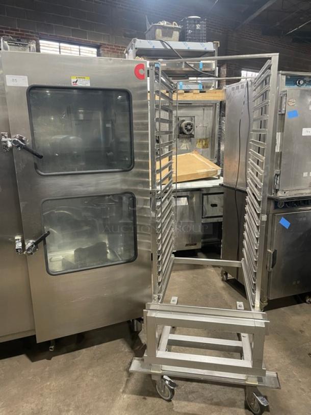 Alto-Shaam Combitherm 2020G stainless steel full-height combi oven with roll-in rack, natural gas powered, on legs.