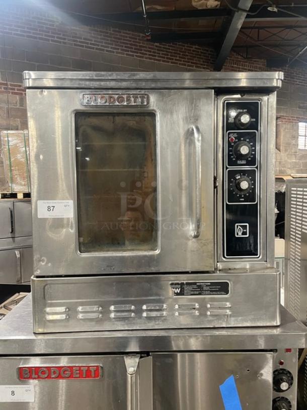 Blodgett single door half-size convection oven, stainless steel, natural gas powered, with wired oven rack and control panel.