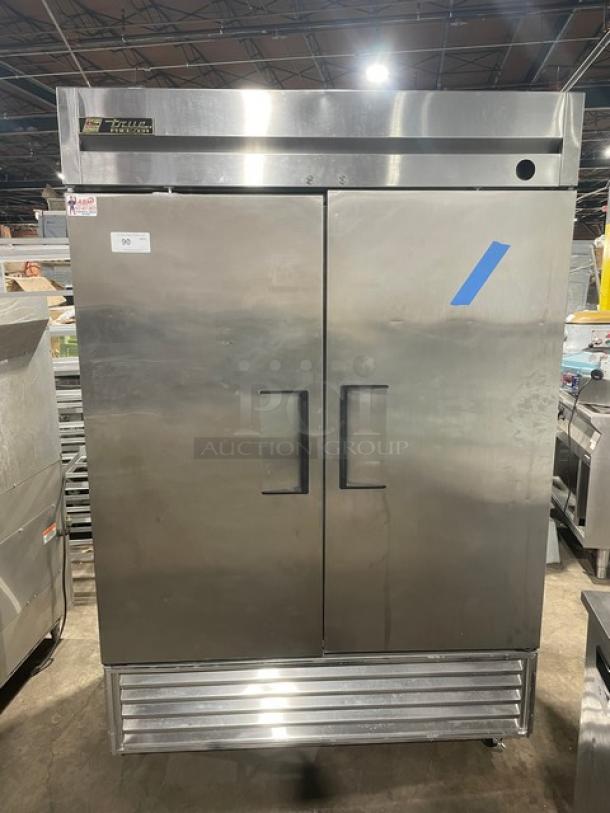 True T49F stainless steel 2-door reach-in freezer with poly coated racks, 115V, 1-phase, on casters. SN: 1-4240963.