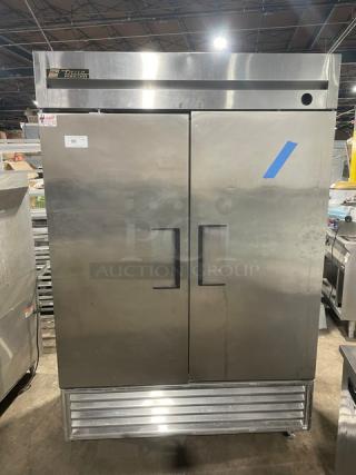 True Commercial Stainless Steel Electric Powered 2 Door 2 Section Reach-In Freezer! With Poly Coated Wired Oven Racks! Model: T-49F SN: 1-4240963! 115V 1 Phase! On Casters! - Item #1221995