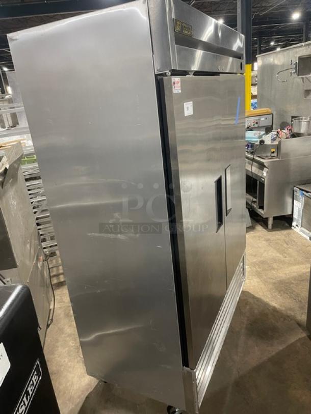 True T-49F stainless steel 2-door reach-in freezer, poly-coated racks, on casters, 115V 1-phase, commercial use.