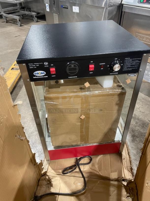 New Cozoc PW5002-10-18 red and black electric pizza warmer with round wire shelf, model SN: 22040193, 120V.