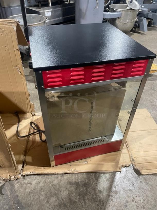 Cozoc PW5002-10-18 electric pizza warmer, red and black, new condition, with round wire shelf, 120V.