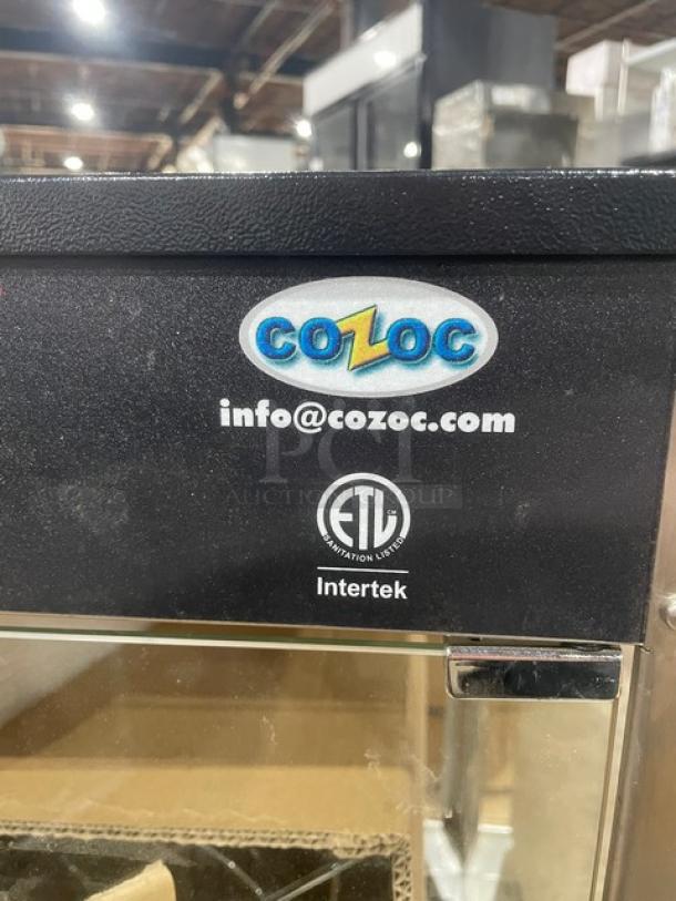 Cozoc PW5002-10-18 countertop pizza warmer, red and black, features round wire shelf, 120V, ETL certified.