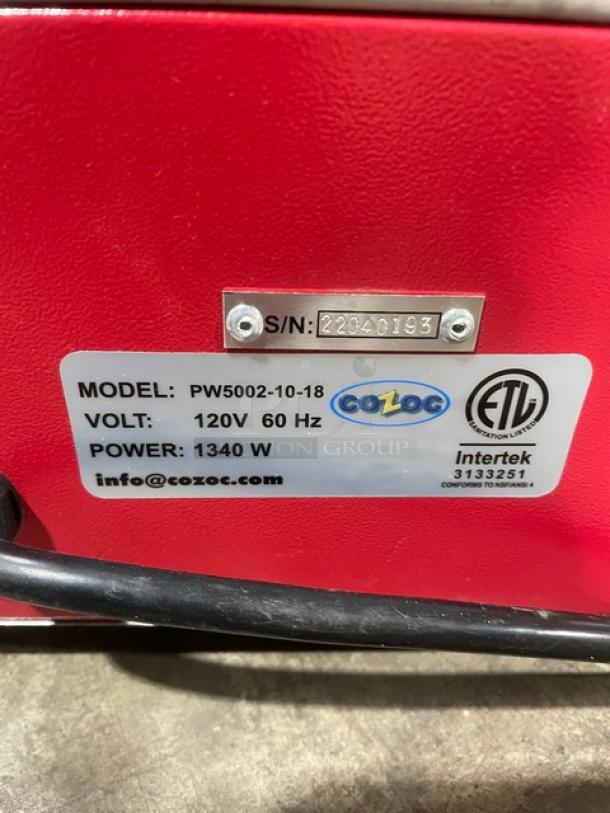 Cozoc PW5002-10-18 countertop pizza warmer, red and black, 120V, 1340W, with round wire shelf, new condition. Serial No: 22040193.