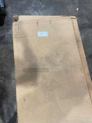 Cardboard box for Heatcraft ULE068BEA Reach-In Unit Cooler, unopened, showing minor wear. Label on the box indicates "230V 1 Phase".