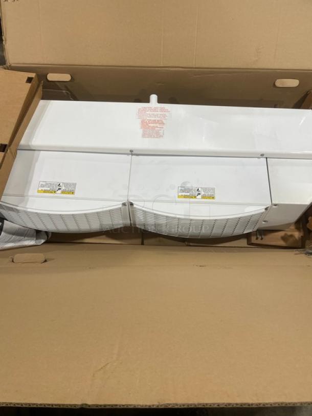 Heatcraft ULE068BEA commercial white reach-in unit cooler, new in box, 230V, 1 phase, tags with model and serial number visible.