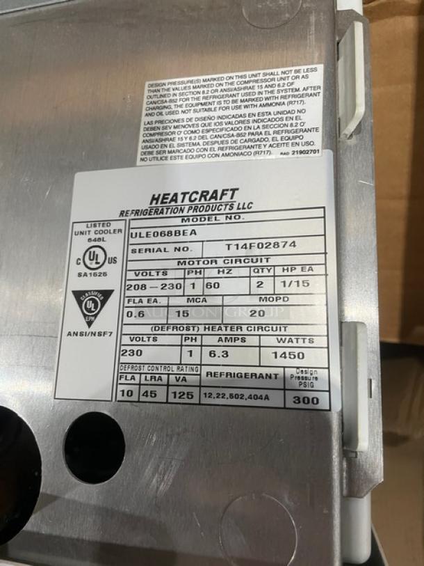Heatcraft white reach-in unit cooler, model ULE068BEA, serial T14F02874, new condition, 230V, single-phase.