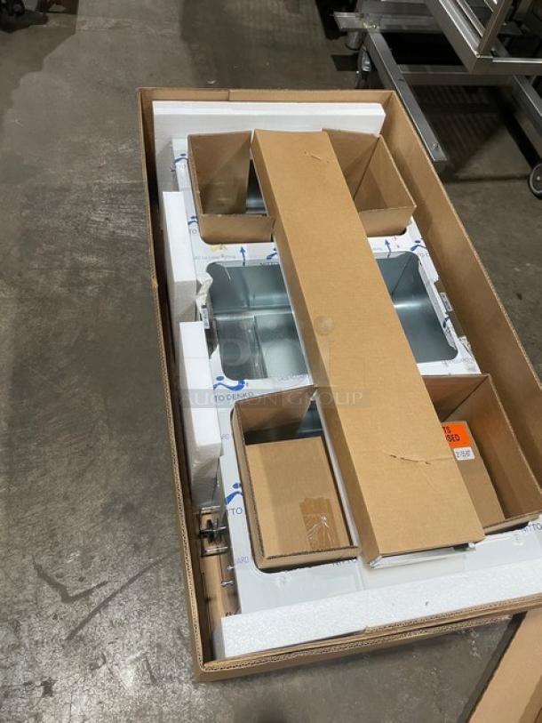 NEW Duke Aerohot Series stainless steel steam table in box, featuring 3 wells, cutting board, and legs. Brand new condition.