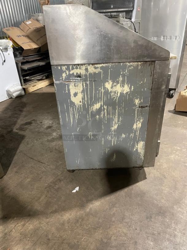 Bari commercial stainless steel electric pizza dough retarder table, two solid doors, marble top, visibly worn condition.