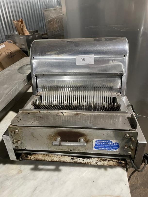 Berkel commercial stainless steel electric countertop bread slicer, used condition, visible wear, Frederick & Slicer Co. label.