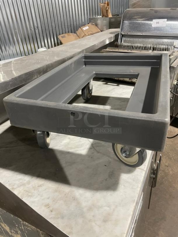 Cambro commercial gray food pan carrying dolly on casters, excellent condition, sturdy plastic build, ideal for kitchen use.
