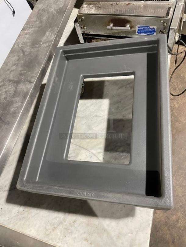 Cambro commercial gray food pan carrying dolly, on casters, durable construction, brand mark visible, good condition.