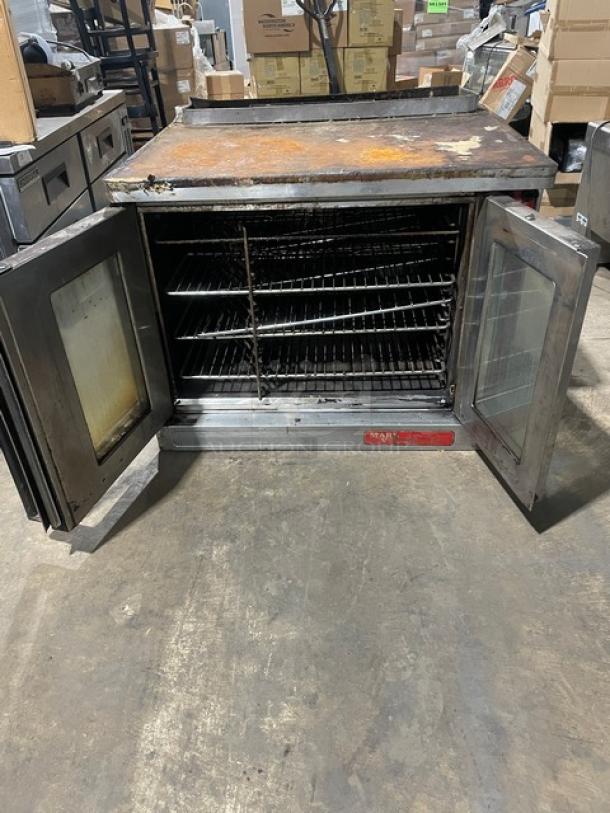 Blodgett Mark V commercial electric convection oven, stainless steel, view-through doors, used condition, interior racks visible.