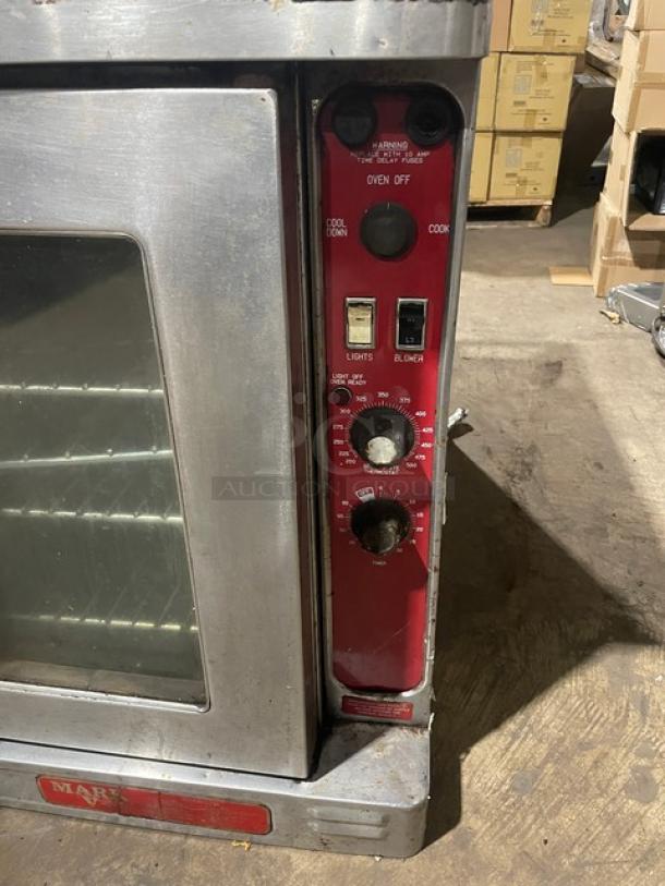 Blodgett Mark V electric convection oven, stainless steel, view-through doors, control panel visible, commercial grade.