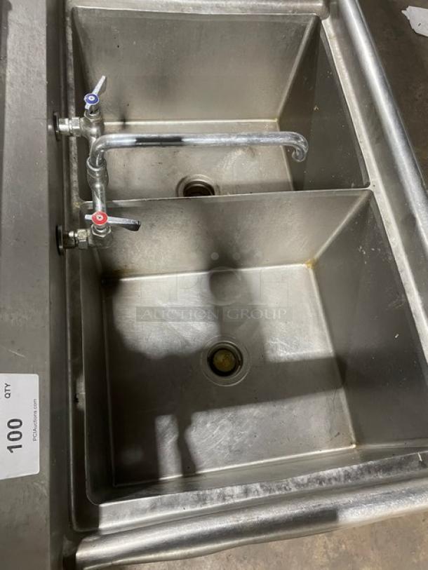 Stainless steel 2-compartment dishwashing sink with faucet and legs, sturdy design, ideal for commercial kitchens.