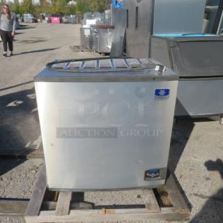 Manitowic Ice Maker, Model IY1106A-261, 1200lb capacity, air cooled, 208-230V, used condition, on wooden pallet.