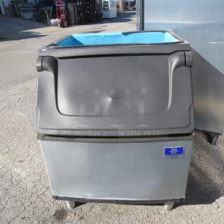 Manitowic Ice Bin Model D400, dimensions 30x34x38 inches, stainless steel, used condition, visible company logo.