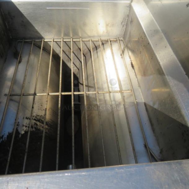 Frymaster Natural Gas Deep Fryer, Model PMJ135SD. Stainless steel body, internal grate visible. Size: 16x32x43 inches.