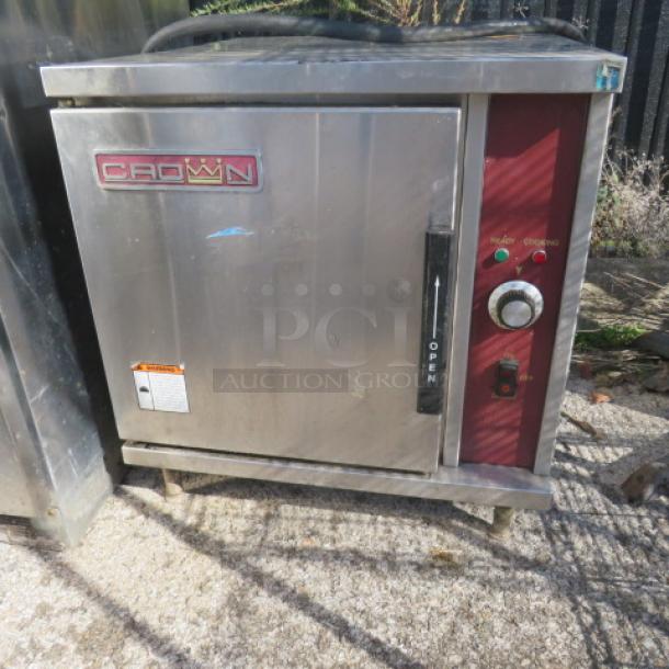 Crown electric steamer, Model EPX-5, 208V, 24x27x26 in. Stainless steel, operational condition when removed, features control panel.