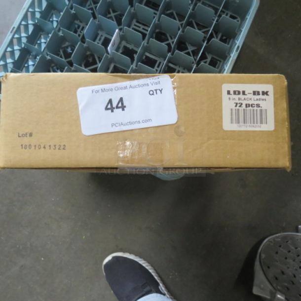 Box containing 72 new 9-inch black poly ladles, sealed and labeled LDL-BK. Visible auction tag indicates quantity and lot number.