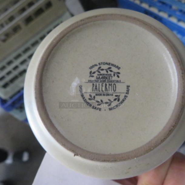 Stoneware coffee mug base showing "Palermo" label with dishwasher and microwave safe marking, pristine condition.