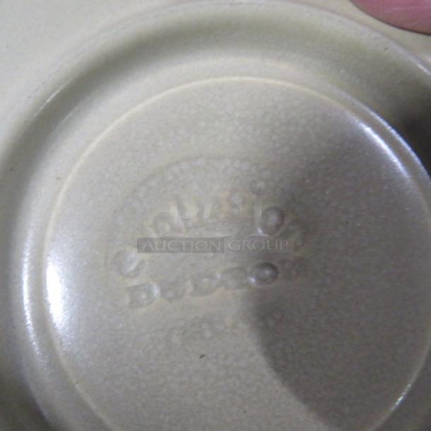 NEW Evolution 7 Inch Saucer, marked with logo. Beige with subtle texture. Excellent condition. Model 12XBID.