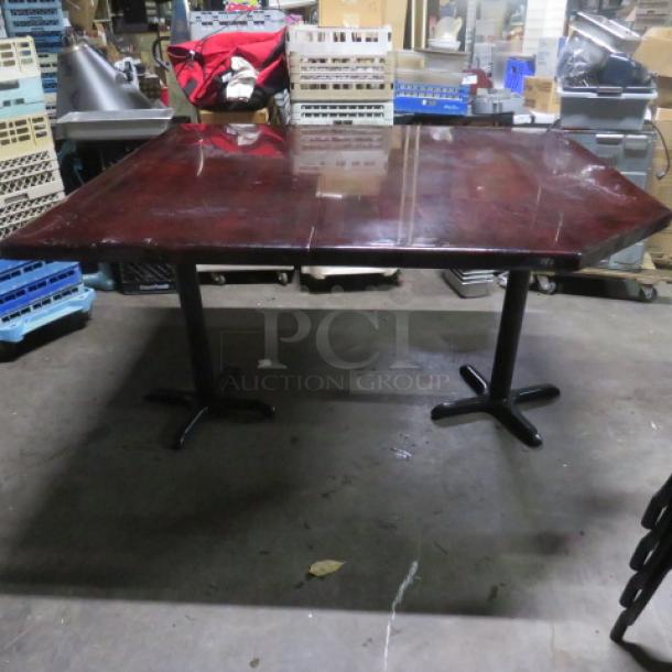 Wooden table top with dual bar height base, dimension 62x56x43 inches, glossy finish, minor surface wear.